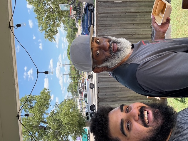 expert craftsman working on teak furniture