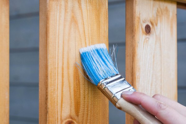 applying protective insecticide treatment to teak furniture